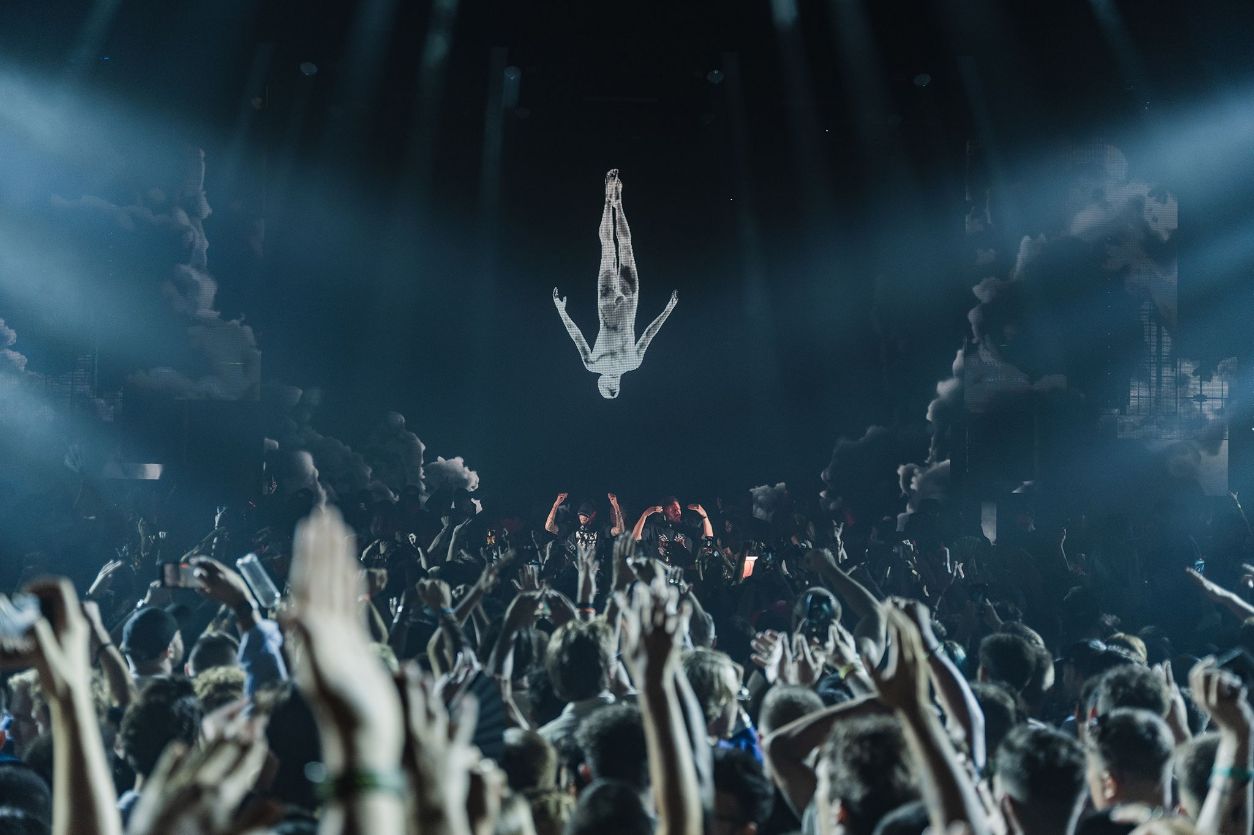 Hands up from the audience at Afterlife